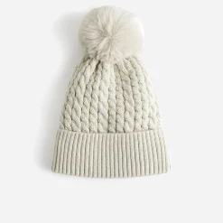 Bonnet TEXTO beige en tricot torsadé à pompon