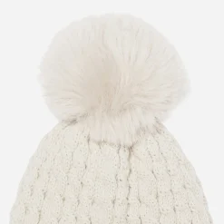 Bonnet TEXTO beige en tricot torsadé à pompon