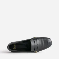 Mocassin noir en cuir rivets dorés